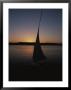 Sunset Outlines The Curve Of A Felucca Sail On The Nile River by Stephen St. John Limited Edition Print
