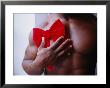 Muscular Man With Red Bow by Debra Cohn-Orbach Limited Edition Print