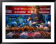 Night-Time Food Stall On The Waterfront, Surat Thani, Thailand by Joe Cummings Limited Edition Print