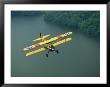 Vintage Stearman 43 Biplane Flies Over The Elk River by Stephen Alvarez Limited Edition Pricing Art Print