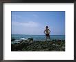 A Woman Stands Looking At The Mediterranean In Menorca, Spain by Taylor S. Kennedy Limited Edition Pricing Art Print