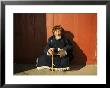 A Man Sits In The Sun In Ulaanbaatar, Mongolia by Ed George Limited Edition Print