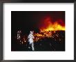 Climbers In Protective Clothing Move Away From The Lava Lake by Peter Carsten Limited Edition Pricing Art Print