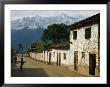The Andes Mountains Looming Over The Town Of Huancacalle by Gordon Wiltsie Limited Edition Print