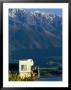 Woman Reading Map In Campervan With Mountain Behind, Kaikoura, New Zealand by Philip & Karen Smith Limited Edition Print