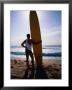 Surf Life-Saver Standing With Long-Board On Narrabeen Beach, Sydney, Australia by Trevor Creighton Limited Edition Print