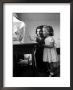 Jackie Kennedy, Wife Of Sen, And Daughter Caroline Watching Bird In Cage, At Home by Alfred Eisenstaedt Limited Edition Print