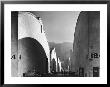 People Walking Between Sound Stages At Warner Brothers Studio by Margaret Bourke-White Limited Edition Print