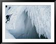 A Man Climbs Outside A Snow Cave by Dugald Bremner Limited Edition Print