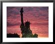 Statue Of Liberty At Sunset, Nyc by Whitney & Irma Sevin Limited Edition Print