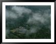 Aerial Of The Ruins Of A Mayan City Located Deep In The Forest by Kenneth Garrett Limited Edition Print