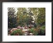 Couple With Coffee In Garden Cafe, Mount Oliveto, Italy by John & Lisa Merrill Limited Edition Pricing Art Print