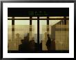 People Silhouetted In Smoking Room At Gimpo Airport, Seoul, South Korea by Johnson Dennis Limited Edition Pricing Art Print