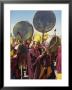 Yellow Hat Tibetan Buddhist Monks Playing Drums At Festival, Naqu (Nagchu) (Nakchu), Tibet, China by Maurice Joseph Limited Edition Print