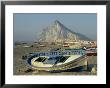 Boats Pulled Onto Beach Below The Rock Of Gibraltar, Gibraltar by Charles Bowman Limited Edition Print