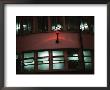 Green And Red Lights On The Star Ferry Terminal In Hong Kong by Eightfish Limited Edition Print