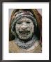 Face Caked With Clay, A Margarima Tribesman Smiles For The Camera by Jodi Cobb Limited Edition Pricing Art Print
