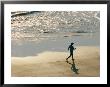 A Jogger Runs Along The Beach by Joel Sartore Limited Edition Print