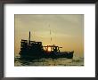A Fishing Boat In The Low Light by B. Anthony Stewart Limited Edition Print