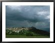 Dark, Cloud-Filled Sky Over Baranello And Surrounding Countryside by O. Louis Mazzatenta Limited Edition Print