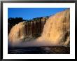 Saltos Hacha Falls, Discoloured By Tannin (Tanino) From Trees And Plants, Canaima, Venezuela by Krzysztof Dydynski Limited Edition Print