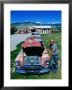 Petroliana Collector Standing Next To Old Car, Montana by Holger Leue Limited Edition Print