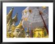 Mystical Figure, White Umbrella And Golden Stupas, Shwedagon Paya, Rangoon, Myanmar (Burma) by Eitan Simanor Limited Edition Print