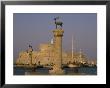 Antelopes On Columns At Entrance To Mandraki Harbour, Rhodes, Dodecanese Islands, Greece by David Beatty Limited Edition Pricing Art Print