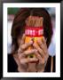 Woman Holding Prayer Sticks At Wong Tai Sin Temple, Kowloon, China by Michael Coyne Limited Edition Print