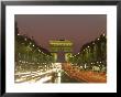 Avenue Des Champs Elysees And The Arc De Triomphe At Night, Paris, France, Europe by Neale Clarke Limited Edition Print