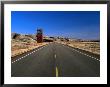 Highway And Abandoned Grain Elevator In Ghost Town Of Dorothy, Alberta, Canada by Barnett Ross Limited Edition Print