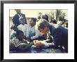 Presidential Contender Bobby Kennedy Stops During Campaigning To Shake Hands African American Boy by Bill Eppridge Limited Edition Pricing Art Print