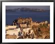 Tourists Watching Sunset, Santorini, Greece by Walter Bibikow Limited Edition Print