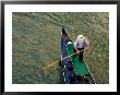 A Gondolier Steers His Craft Through A Canal, Venice, Veneto, Italy by Glenn Beanland Limited Edition Print