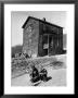Coal Miner's Boys Playing With Puppy Outside Ramshackle, Two Story House In Dreary Mining Town by Alfred Eisenstaedt Limited Edition Print