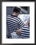 Gondolier Reading Newspaper, Venice, Veneto, Italy by Guy Thouvenin Limited Edition Print