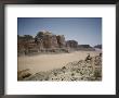 A Man Looks Out Over The Desert Landscape by Luis Marden Limited Edition Print