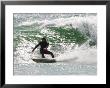 Surfer Goes Right At Tamarack Surf Beach, Carlsbad, California, Usa by Nancy & Steve Ross Limited Edition Print