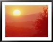A Large Sun Setting Over The Landscape by Kenneth Garrett Limited Edition Print