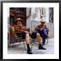Elderly Couple Relaxing Outside Their House, Palma De Mallorca, Spain by Christian Aslund Limited Edition Print