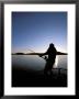 An Angler Fights A Large Halibut, Prince William Sound, Alaska, Usa by Hugh Rose Limited Edition Print