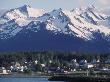 View Of Haines, With The Coastal Town In Front Of Snowy Mountains, Haines, Alaska by Stephen Sharnoff Limited Edition Print