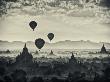 Hot Air Balloons Floating Above The Temples Of Pagan, Myanmar At Sunrise by Scott Stulberg Limited Edition Print