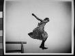 Young Ethel Merritt Jumping In The Air At Coney Island by Wallace G. Levison Limited Edition Print