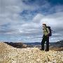 A Woman Hiking In The Highlands Of Iceland, Carrying A Backpack by Thorsten Henn Limited Edition Pricing Art Print