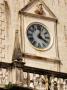 Intricate Clock And Carving On The Palace Hotel In Hvar, Dalmatian Coast, Croatia by Olwen Croft Limited Edition Print