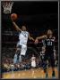 San Antonio Spurs V New Orleans Hornets: Marcus Thornton And Tim Duncan by Layne Murdoch Limited Edition Print