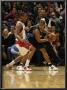 Denver Nuggets V Toronto Raptors: Aron Afflalo And Demar Derozan by Ron Turenne Limited Edition Print