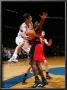 Toronto Raptors V Washington Wizards: Kirk Hinrich And Reggie Evans by Ned Dishman Limited Edition Print