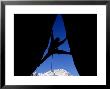 Silhouette Of Man Rock Climbing On Split Rock, Ca by Greg Epperson Limited Edition Pricing Art Print